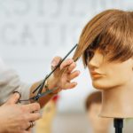 Haircutting Education - Hairstylist Explaining Haircutting Techniques